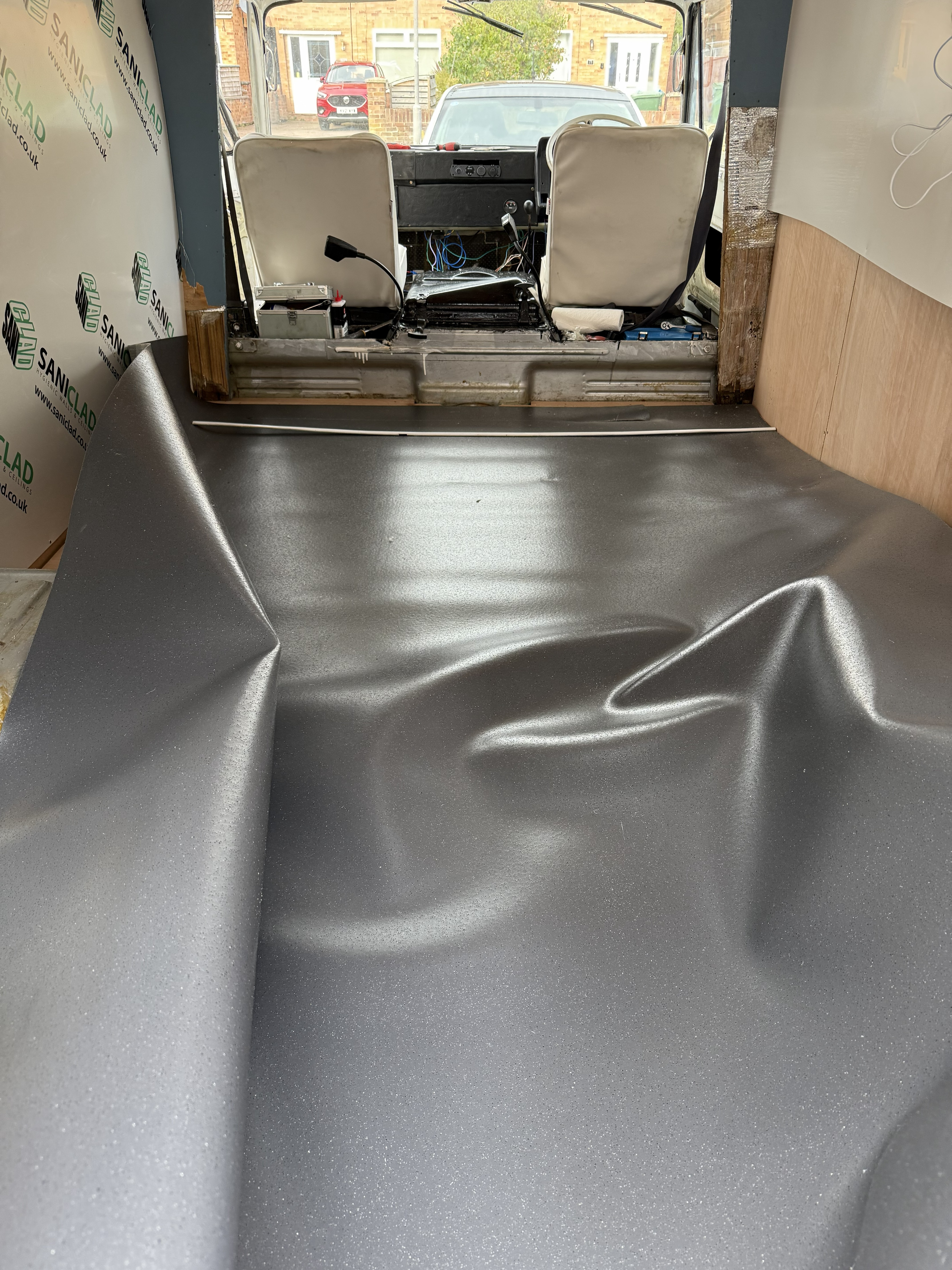 Floor being laid inside Betty
